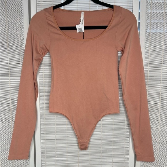 Babaton Tops - Babaton Long Sleeve Bodysuit Pink Size S
